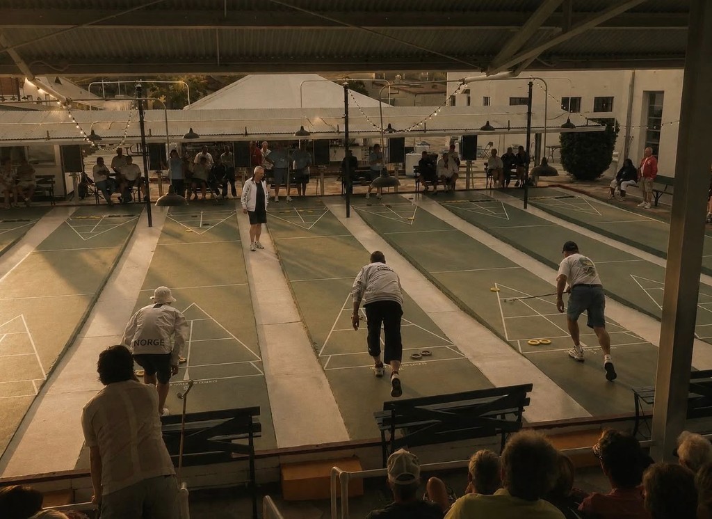 Players on outdoor shuffleboard courts